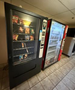an open refrigerator with food inside of it at Dodgeville inn & suites in Dodgeville