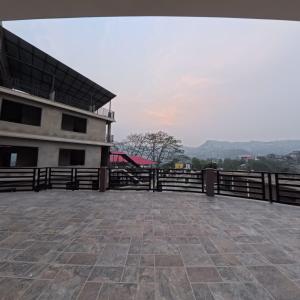 a view from the roof of a building at The View Hotel Falkland in Āīzawl
