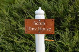 a sign that says scrub tiny house on a pole at Scrub Tiny House by Tiny Away in McLaren Vale +23 photos