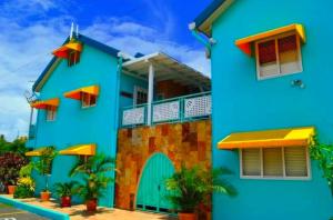 a colorful house with a blue at Crown Point Condos by Nasin in Crown Point