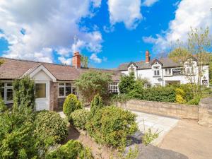 a house with a garden in front of it at Riverlea in Rhyl