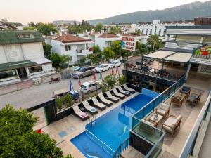 an overhead view of a swimming pool in a city at Britannia Hotel in Kemer
