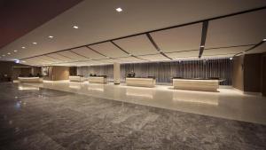 a lobby with a row of desks in a building at Hyatt Regency Chicago in Chicago