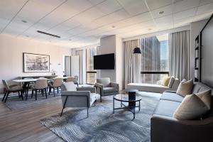 a living room with a table and chairs at Hyatt Regency Chicago in Chicago