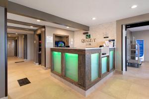 a lobby of a clinic with a bar in the middle at Quality Inn Mishawaka - South Bend in Mishawaka