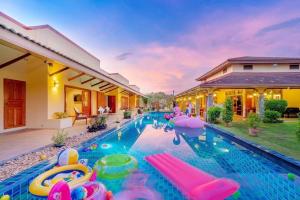 an image of a swimming pool in a house at Taratai Villa Guest House in Nong Prue