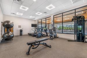 a gym with treadmills and cardio equipment in a building at Country Inn & Suites by Radisson, Amarillo Central in Amarillo