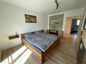 a bedroom with a bed in a room at Bei Kleins in Nümbrecht