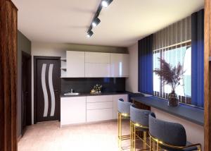 a kitchen with white cabinets and blue chairs at Regim Hotel Hanea jacuzzi in camera,piscina exterioara si sauna comuna in Sibiu