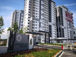 a large building with a sign in front of it at D'Camellia 43500 Semenyih Homestay in Semenyih