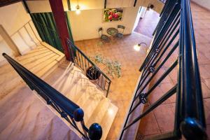 an overhead view of a staircase in a house at דונה דינה Donna Dina in Amirim