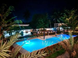 an image of a swimming pool at night at Severina Lodge in San Juan +16 photos