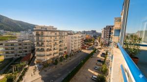 a view of a street in a city with buildings at Sea & Sky apartment in Skataj +1 photo