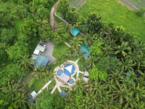 an aerial view of a resort with palm trees at Starksway Resort in Calubcub Primero
