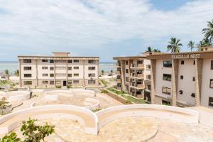 a view of the buildings at the resort at Sandy Shore Beach Apartments - Karibu Quarters in Kikambala