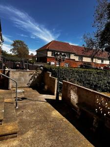 a building with a fence in front of a yard at 5 Bedroom house Doncaster in Balby