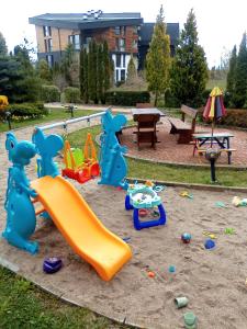 a playground with play equipment in a park at Aspen Heights 4 beds studio in Bansko