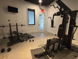 a room with a gym with exercise equipment in it at Lafayette in Elizabeth