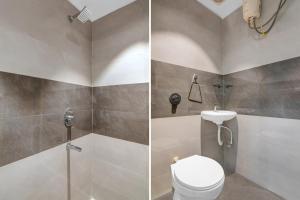 a bathroom with a toilet and a shower at Hotel Royal City Palace in Kolkata