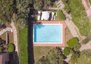 an overhead view of a swimming pool in a yard at Villa Gilda - Private Pool by Host Hero in Stintino