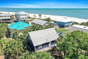an aerial view of a beach with houses and the ocean at Latitude Adjustment by Pristine Properties Vacation Rentals in Indian Pass