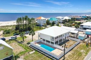 an aerial view of a house and the beach at Treasure Road by Pristine Properties Vacation Rentals in Indian Pass