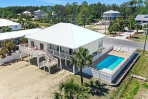 an aerial view of a house with a swimming pool at Treasure Road by Pristine Properties Vacation Rentals in Indian Pass