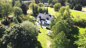 an aerial view of a house with trees at Wellness Chalet Luby in Luby