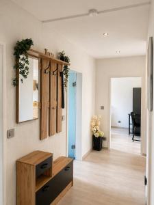 a living room with a dresser and a mirror at Harpener Hellweg 457 in Bochum