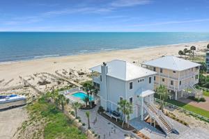 an aerial view of a house and the beach at Coastal Cove by Pristine Properties Vacation Rentals in Indian Pass