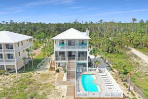 an aerial view of a house with a swimming pool at Coastal Cove by Pristine Properties Vacation Rentals in Indian Pass