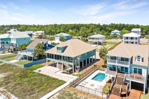 an aerial view of a home with a swimming pool at Farr Away Living by Pristine Properties Vacation Rentals in Indian Pass
