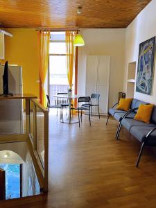 a living room with a couch and a table at Nel Cuore di Lanciano - WeclHome in Lanciano