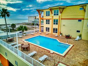 a swimming pool on the balcony of a house at Summerhouse 101 - Pearl of the Gulf by Pristine Properties Vacation Rentals in Mexico Beach