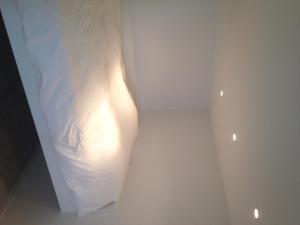Una cama o camas en una habitación de Studio 19