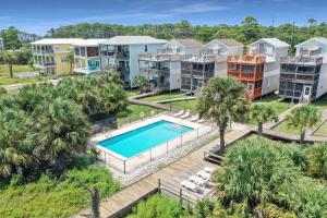 an aerial view of a pool and houses at Gulfside GEM by Pristine Properties Vacation Rentals in Indian Pass
