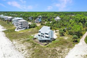 an aerial view of a house on a beach at Indian Summer by Pristine Properties Vacation Rentals in Indian Pass