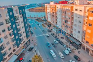 an aerial view of a city street with cars at JB Apartment -B18- in Kenitra