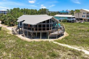 an aerial view of a house with a metal roof at WindScape by Pristine Properties Vacation Rentals in Indian Pass