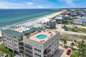 an aerial view of a building and the beach at The Vue 2C by Pristine Properties Vacation Rentals in Mexico Beach