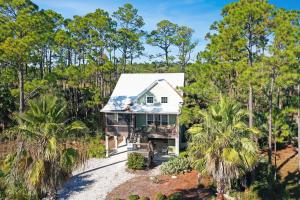 an aerial view of a house in the forest at Rehoboth Cottage by Pristine Properties Vacation Rentals in Indian Pass