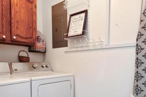 a kitchen with a white stove and a sink at Sea Shell by Pristine Properties Vacation Rentals in Mexico Beach +38 photos