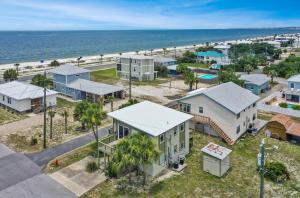 an aerial view of a beach with houses and the ocean at Beach View Lower by Pristine Properties Vacation Rentals in Mexico Beach