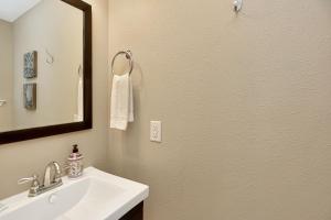 a bathroom with a sink and a mirror at Sweet Destiny by Pristine Properties Vacation Rentals in Indian Pass +19 photos