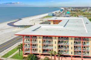 an aerial view of a building next to the beach at Paradise Shores 302 Serenity Shores by Pristine Properties Vacation Rentals in Mexico Beach