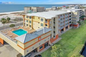 an aerial view of a building with a swimming pool at Summerhouse 209 by Pristine Properties Vacation Rentals in Mexico Beach