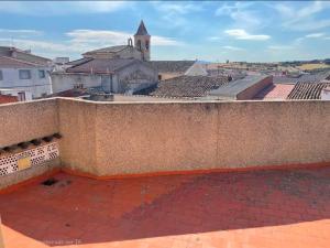 a view of a city from the roof of a building at Casa Villa Zarcillo in Torreorgaz