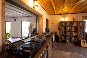 a kitchen with a stove top oven in a room at VILLA FLAKA Boutique Hôtel Wellness in Cargèse