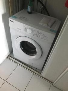 a washing machine sitting on top of a counter at casa del pescatore in San-Nicolao
