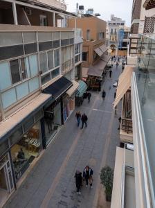 an overhead view of a city street with people walking at Space Row Exclusive Residences in Heraklio